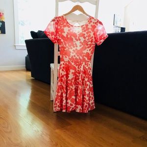 Flirty, fun, open-back mini dress